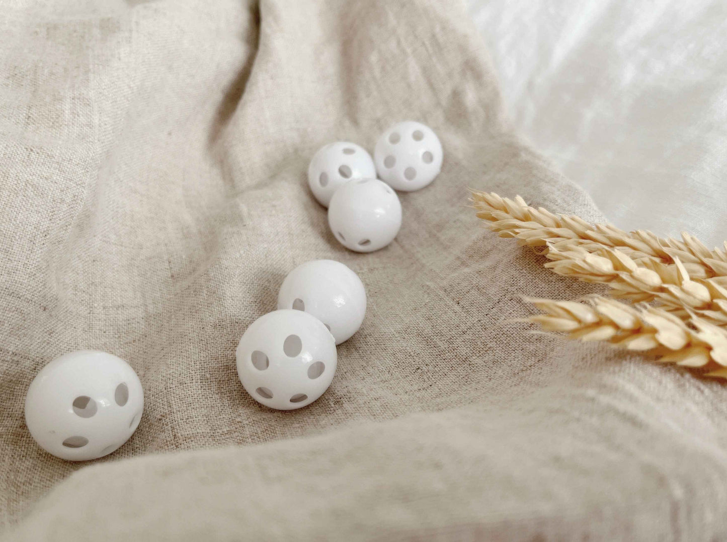 Rasselkugeln für Babys – Unterhaltung und Entwicklung für die Kleinsten - Malea.boutique