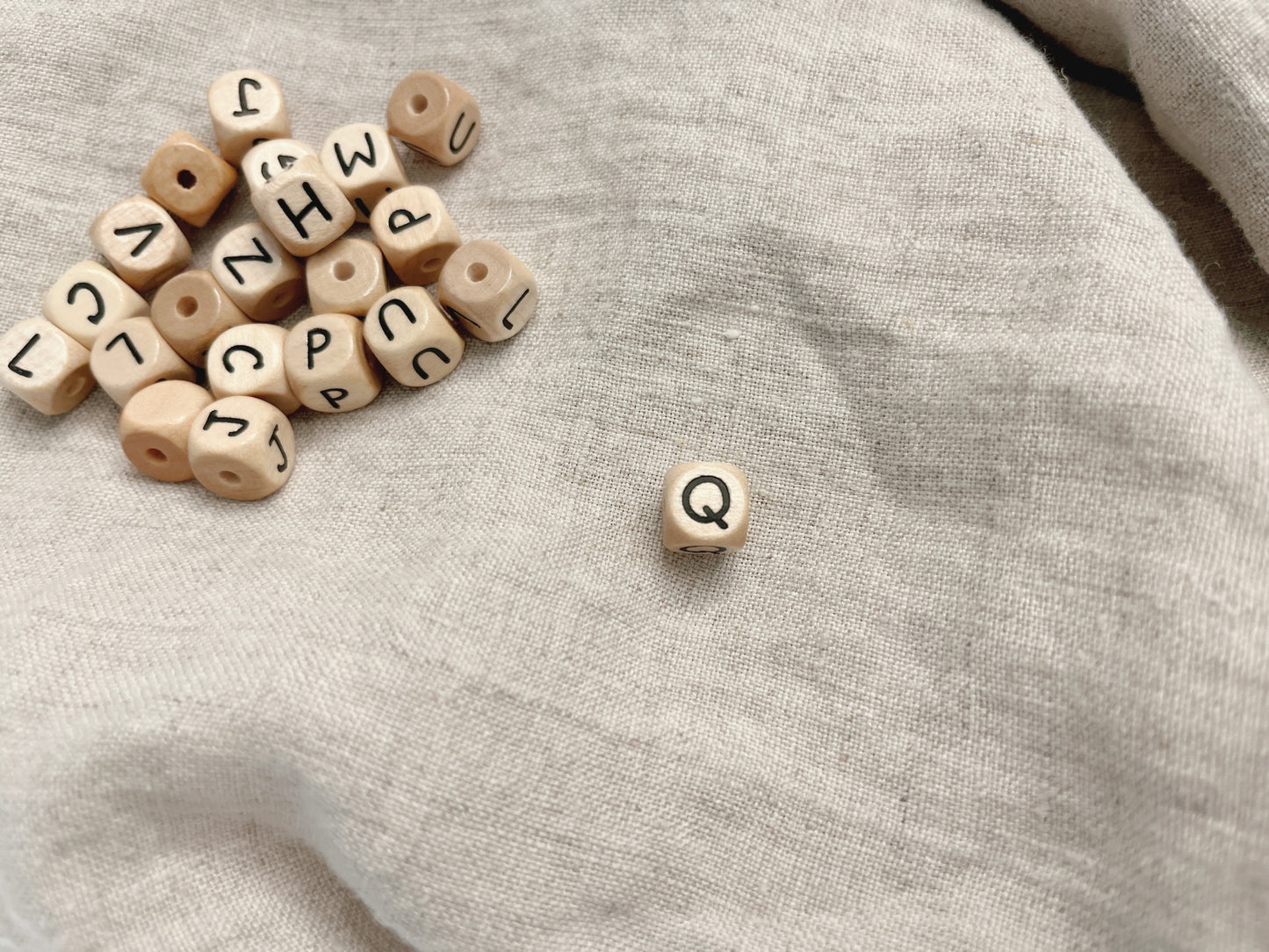Geprägte Buchstabenwürfel, 10 mm, Q