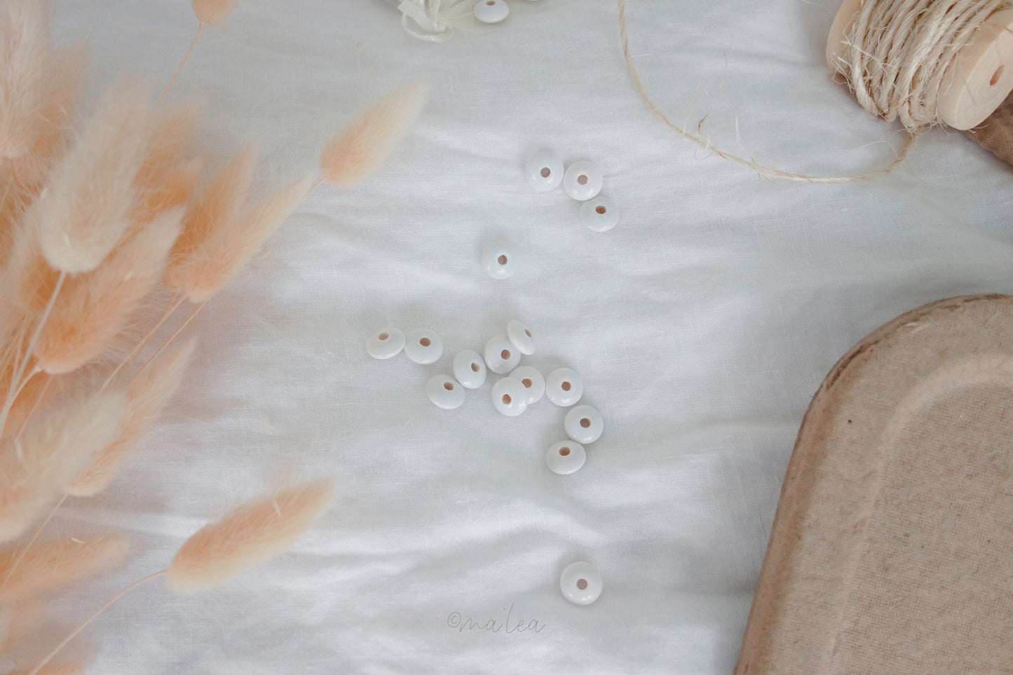 Lentil beads white - 12/6mm